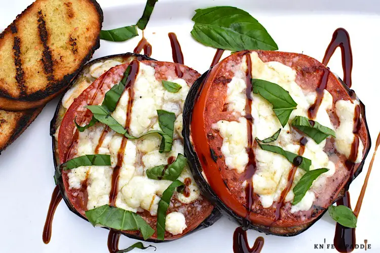 Caprese on the grill with balsamic drizzle and fresh basil and a side of toast