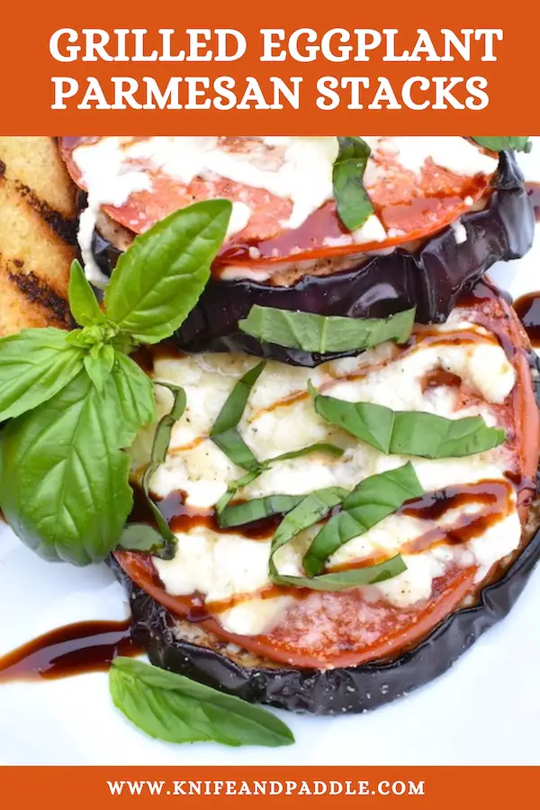 Grilled Eggplant Parmesan Stacks with balsamic glaze and fresh basil topped with mozzarella and parmesan