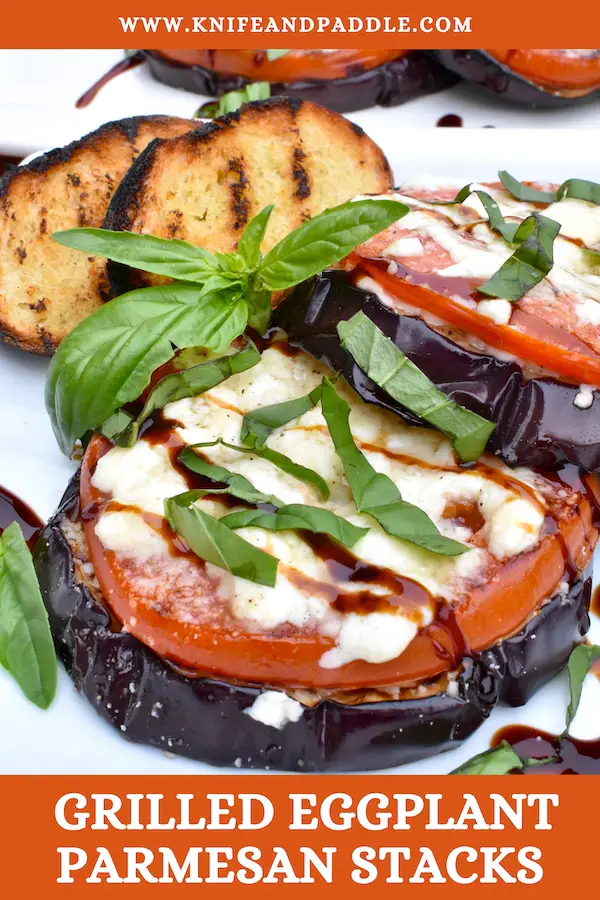 Grilled Eggplant Parmesan Stacks with balsamic glaze and fresh basil topped with mozzarella and parmesan