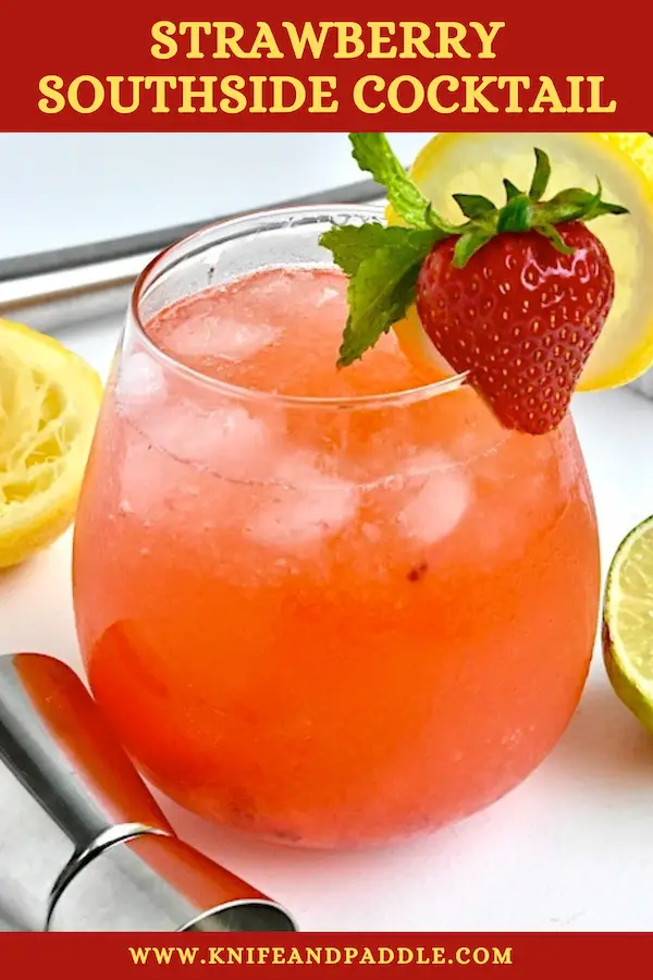 Strawberry Southside Fizz with a lemon wheel, mint sprig and a strawberry for garnish