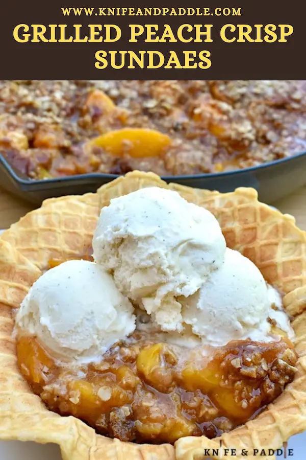 Grilled Peach Crisp Sundaes in a waffle bowl topped with vanilla ice cream 