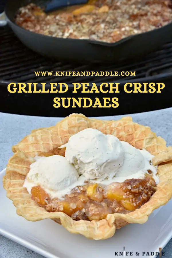 Charred fruit dessert in a waffle bowl topped with a brown sugar, butter and oat topping and a scoop of vanilla ice cream 