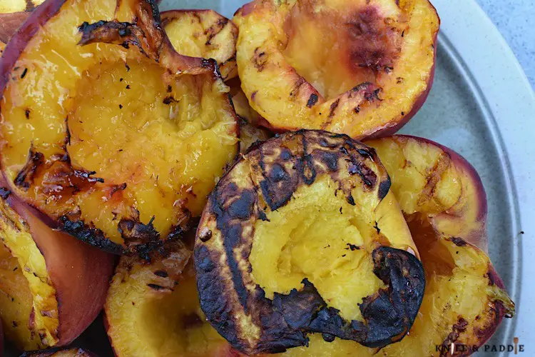 Charred fruit on a plate