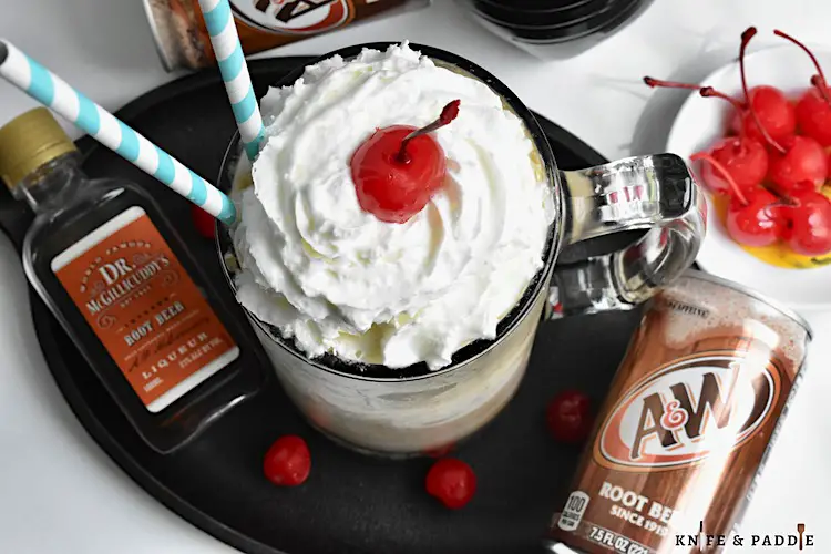 A&W, Dr. McGilllicudy's, ice cream in a beer mug topped with whipped cream and a maraschino cherry 