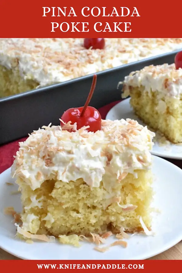 Tropical dessert made with a yellow box cake topped with a crushed pineapple and whipped topping frosting, toasted coconut and a maraschino cherry