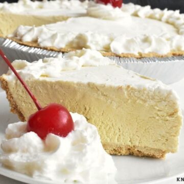 Root Beer Float Pie Topped with whipped cream and a cherry