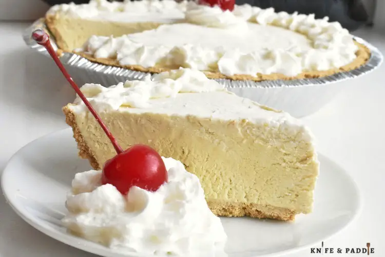 Root Beer Float Pie Topped with whipped cream and a cherry