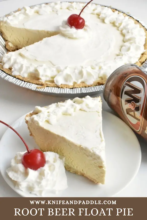 Root Beer Float Pie topped with whipped cream and a maraschino cherry