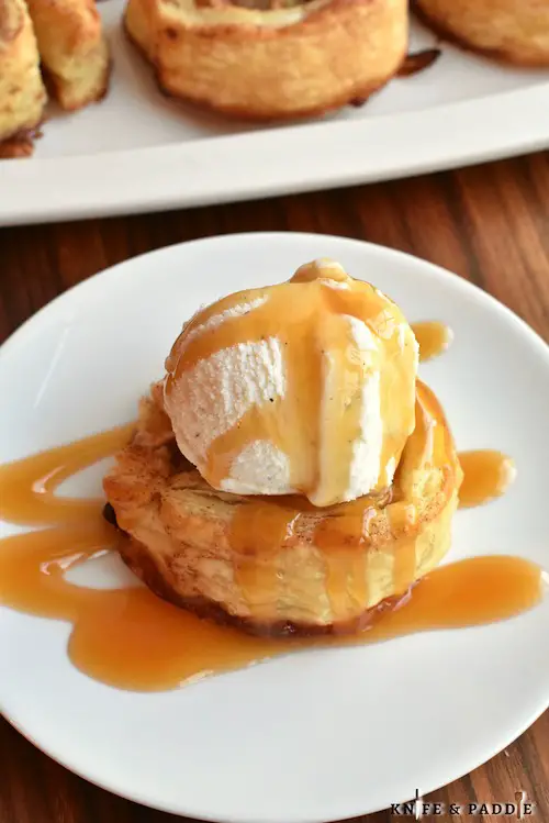 Simple fall dessert made with fruit, puff pastry, cinnamon, sugar and topped with vanilla ice cream and caramel sauce