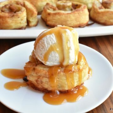 Apple Pinwheels topped with vanilla ice cream and caramel sauce