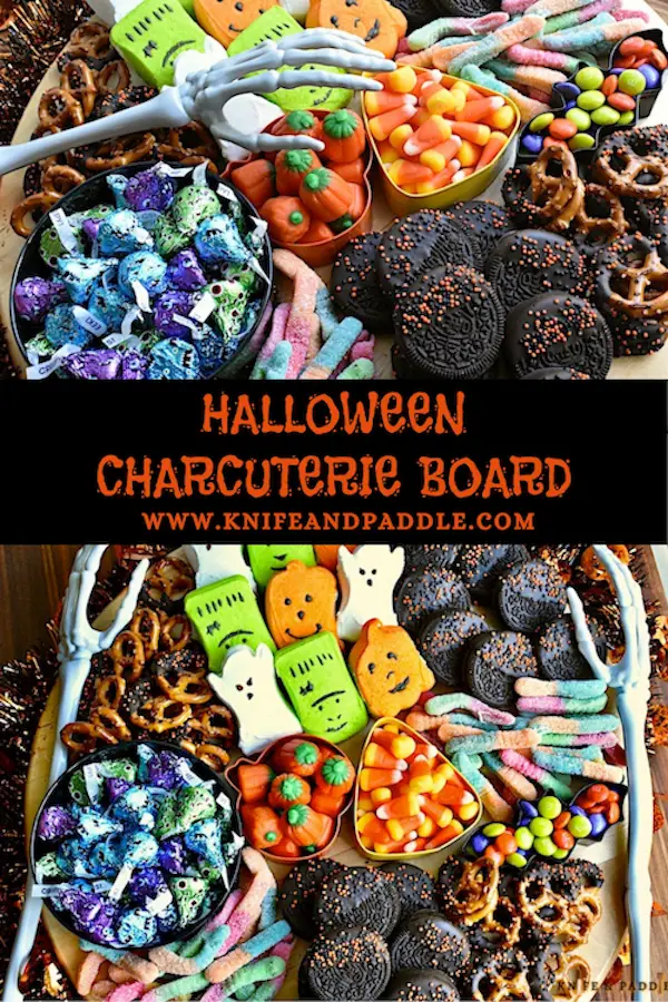 Halloween Charcuterie Board filled with Ghost, Frankenstein and Pumpkin Pepps, Pretzels, Candy Corn, Pumpkin Candy Corn, Gummy worms, M&M's, Oreos, Hershey's Kisses arranged on a platter