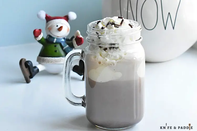 Drunken Snowman Cocktail with Whipped Cream and Chocolate Sprinkles