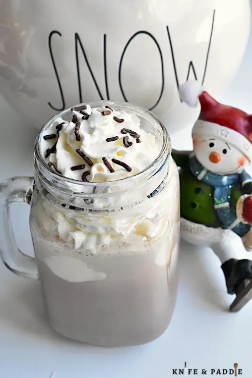 Drunken Snowman Cocktail with Whipped Cream and Chocolate Sprinkles