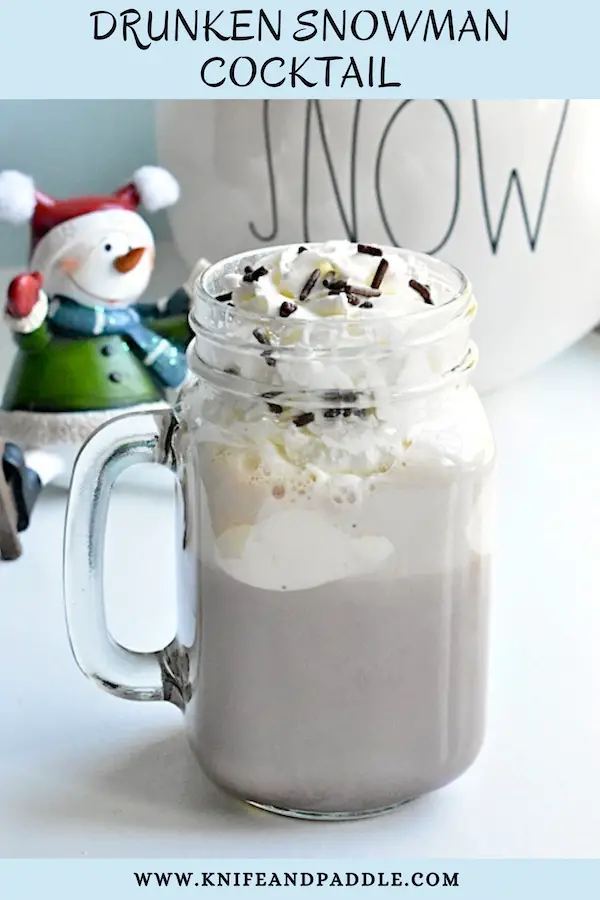 Drunken Snowman Cocktail with Whipped Cream and Chocolate Sprinkles