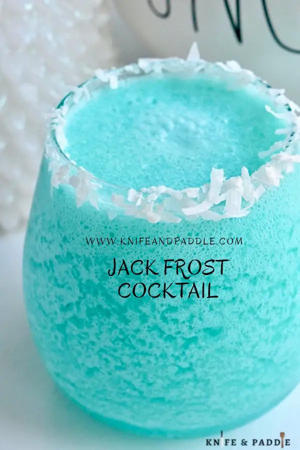 Jack Frost Cocktail with a shredded coconut rim