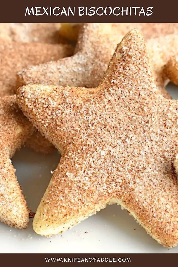 Mexican Biscochitas cut out into a star topped with cinnamon and sugar