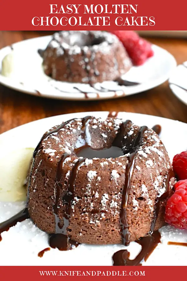 Easy Molten Chocolate Cake with chocolate sauce, raspberries and vanilla ice cream