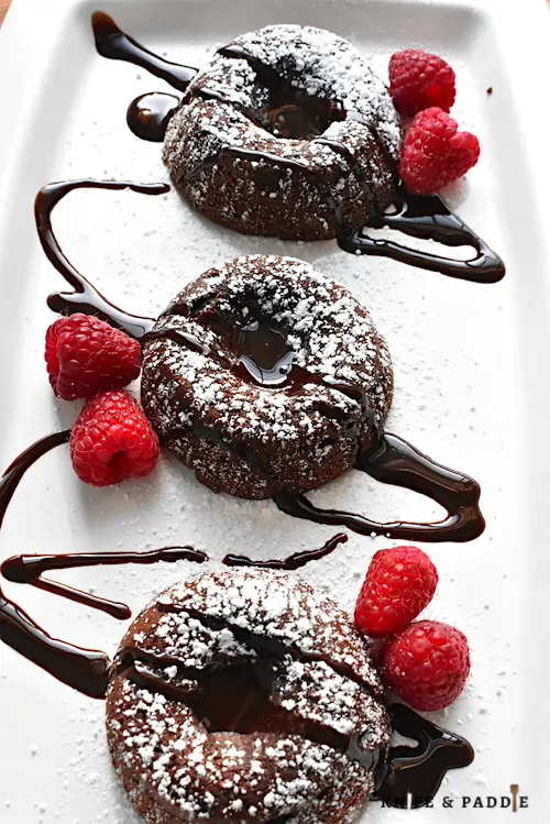 Quick Lava Treats with chocolate sauce and raspberries