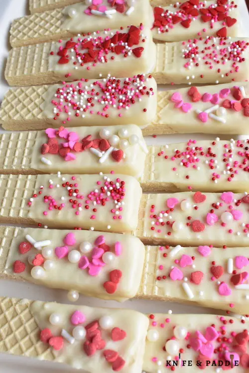 Easy No-bake Treat topped with red and pink hearts and sprinkles