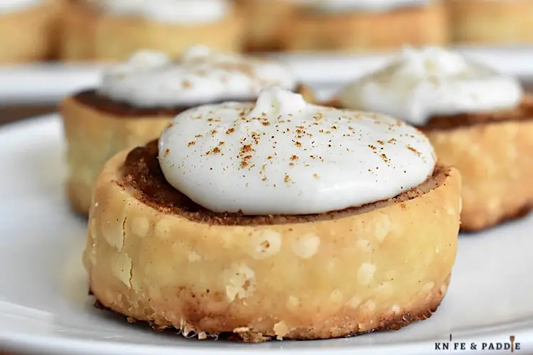 Mini Cinnamon Rolls topped with frosting