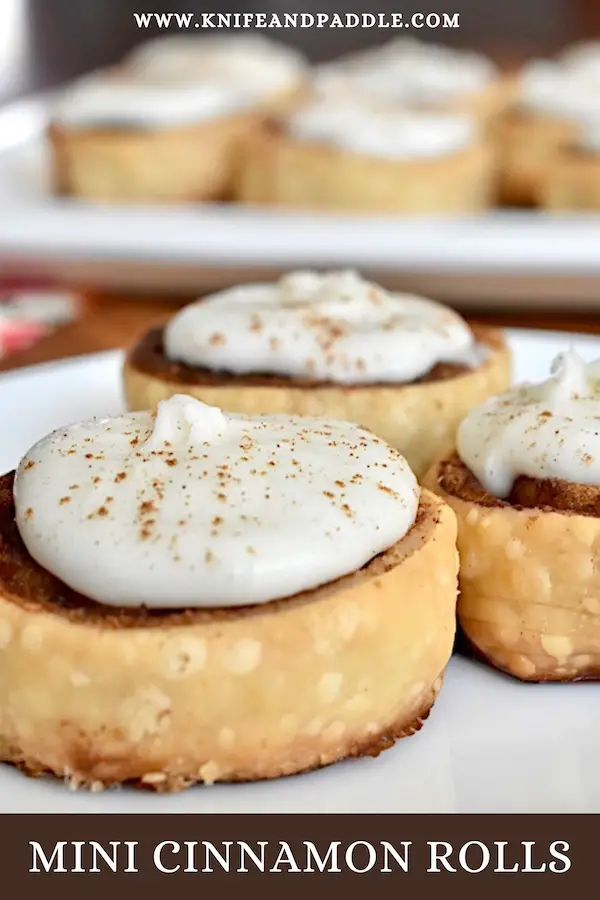 Mini Cinnamon Rolls topped with frosting 